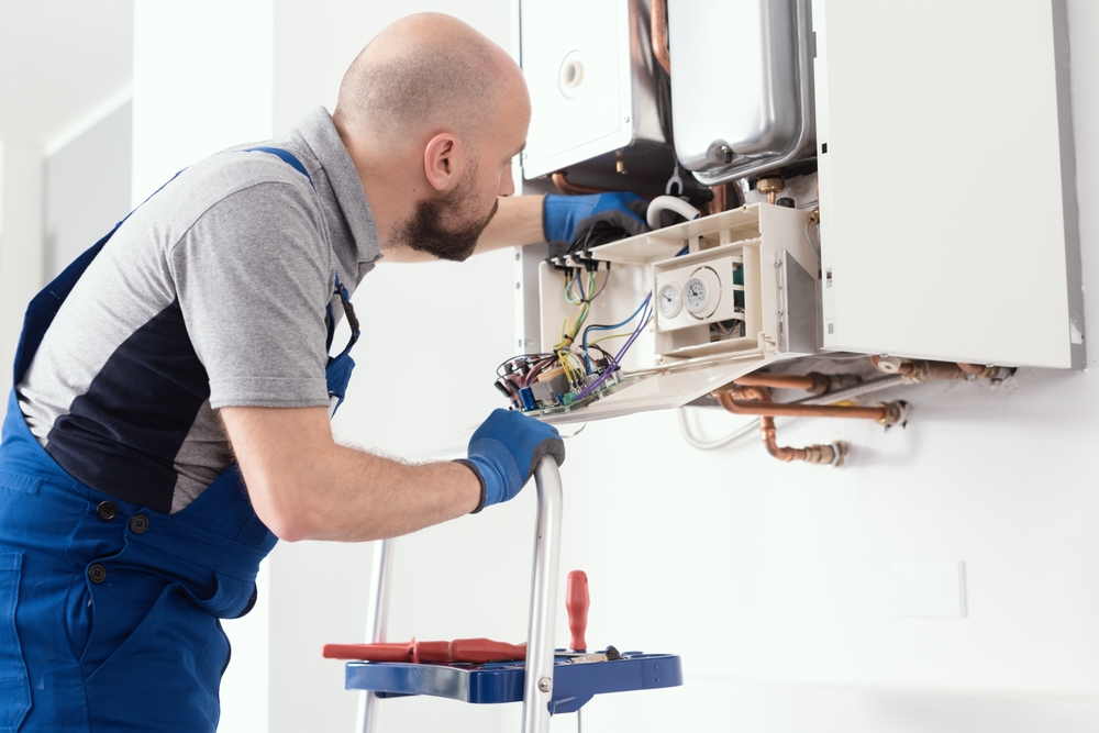 Professional,Boiler,Service:,Qualified,Technician,Checking,A,Natural,Gas,Boiler